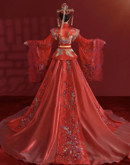 Step into regal splendor with &quot;The Queen&quot; gown—an embodiment of grace, power, and timeless elegance. Illuminate your presence with this majestic ensemble, making a royal statement that captures the essence of regality. Reign over your special day in &quot;The Queen,&quot; where every detail is crafted for a majestic celebration of love and sophistication.