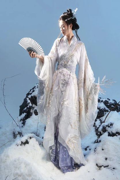 Experience the frost-kissed beauty of Arctic Blossom from the Fantasy Styles Collection. This enchanting ensemble combines winter elegance with floral charm. Elevate your style and bloom in the magic of Arctic Blossom, exclusively at Moon Hanfu