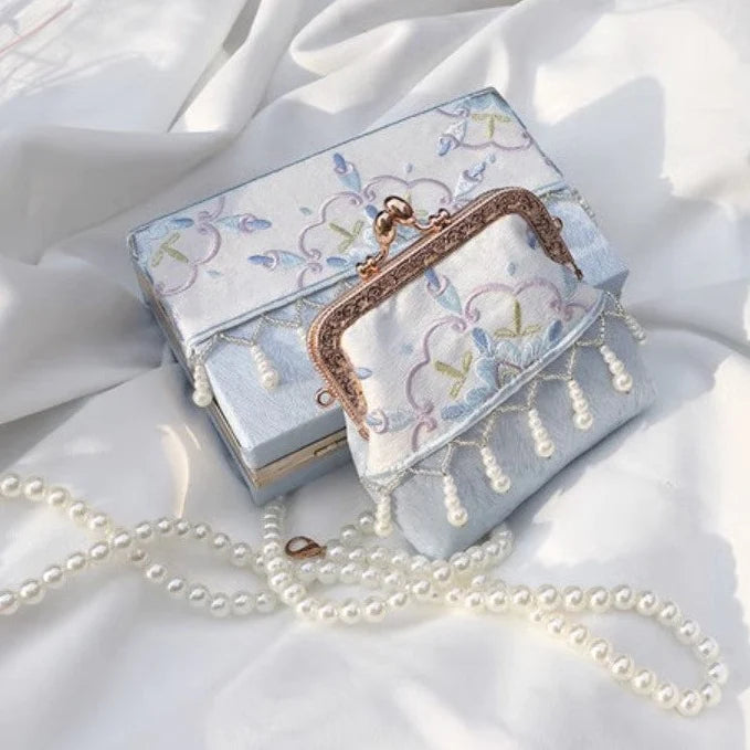 Elevate your style with the Petal Perfection Floral Clutch. Explore our curated collection at Moon Accessories for a fashionable and versatile accessory adorned with delightful floral patterns, adding a touch of natural beauty to your ensemble.