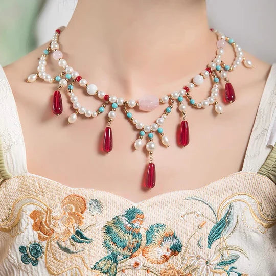 Elevate your style with the elegant Barbara Hanfu Necklace, a perfect complement for your Hanfu, Cheongsam, and Bridal Gowns. Immerse yourself in the timeless beauty of this traditional Han Chinese accessory, reimagined as a captivating necklace with intricate details. Explore our curated collection at Moon Hanfu and adorn yourself with the refined allure of traditional Chinese jewelry.