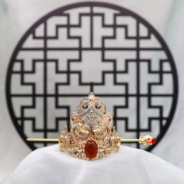 Prince Hanfu Crown - Embrace the regal splendor with the Prince Hanfu Crown. Its majestic design and opulent details exude authority and elegance, making you feel like a distinguished prince. Perfect for formal events and adding a touch of nobility to your Hanfu ensemble.