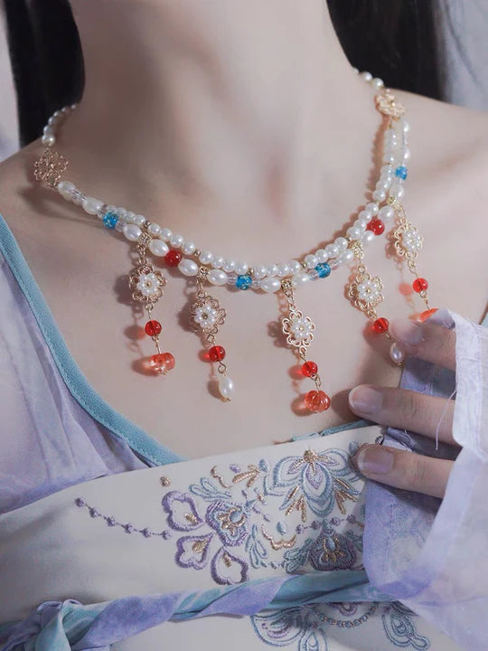 Embrace the essence of Fresh Spring with this Hanfu Necklace, a delightful addition to enhance your Hanfu, Cheongsam, and Bridal Gowns. Immerse yourself in the beauty of this traditional Han Chinese accessory, transformed into a captivating necklace with intricate details. Explore our curated collection at Moon Hanfu and infuse your ensemble with the refreshing allure of traditional Chinese jewelry.