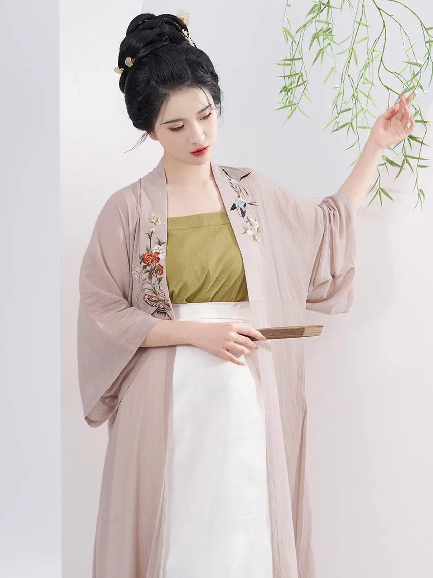 Experience the epitome of style with Classic Elegance Modern Hanfu—a seamless blend of tradition and contemporary allure. Elevate your wardrobe with this captivating ensemble, embodying the timeless beauty of ancient Chinese fashion. Classic Elegance invites you to rediscover grace and cultural richness, seamlessly blending tradition with modern sophistication.