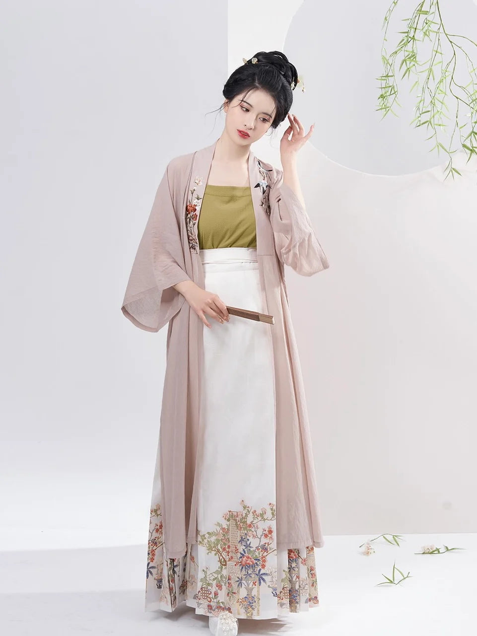 Experience the epitome of style with Classic Elegance Modern Hanfu—a seamless blend of tradition and contemporary allure. Elevate your wardrobe with this captivating ensemble, embodying the timeless beauty of ancient Chinese fashion. Classic Elegance invites you to rediscover grace and cultural richness, seamlessly blending tradition with modern sophistication.