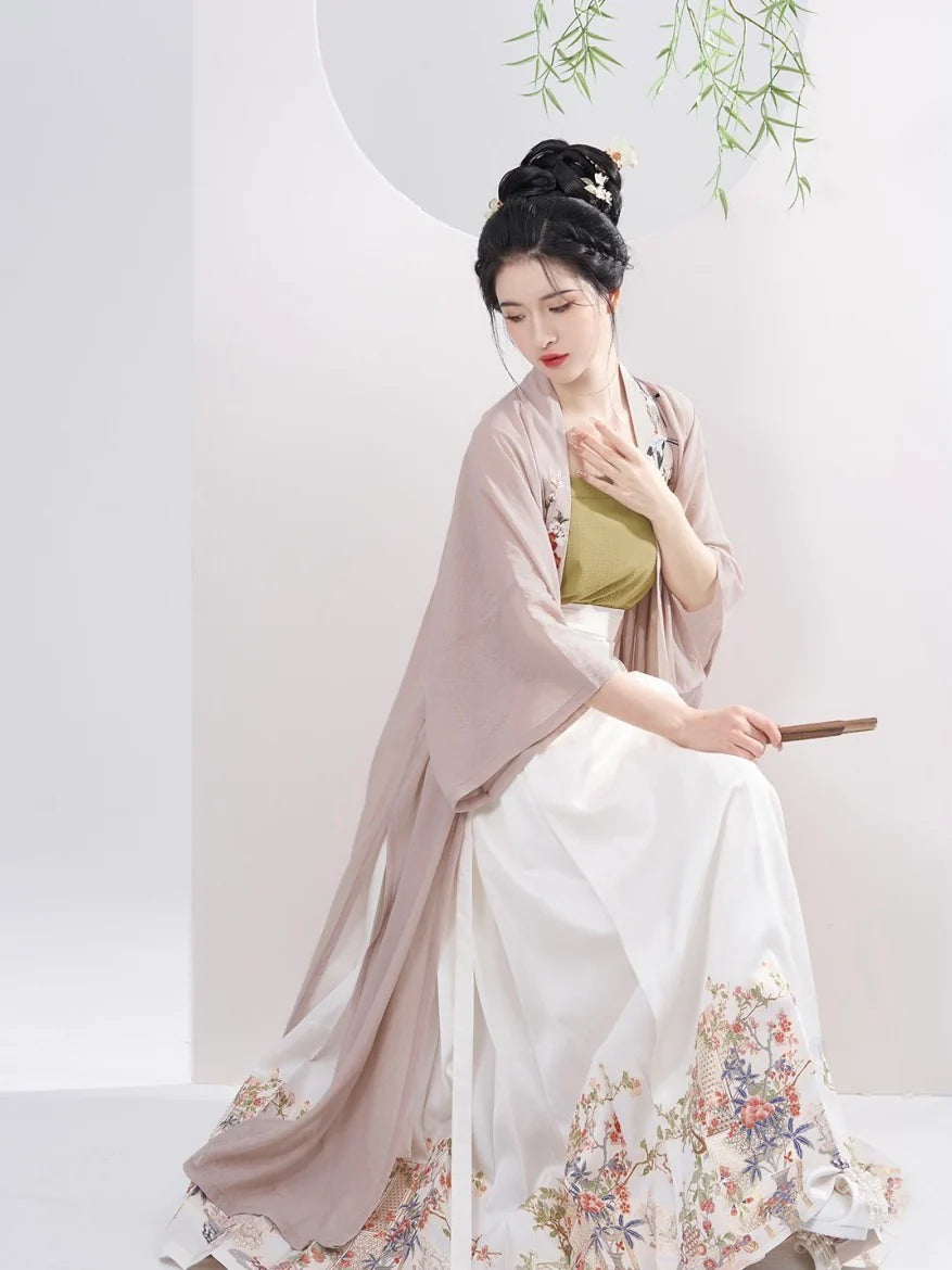 Experience the epitome of style with Classic Elegance Modern Hanfu—a seamless blend of tradition and contemporary allure. Elevate your wardrobe with this captivating ensemble, embodying the timeless beauty of ancient Chinese fashion. Classic Elegance invites you to rediscover grace and cultural richness, seamlessly blending tradition with modern sophistication.