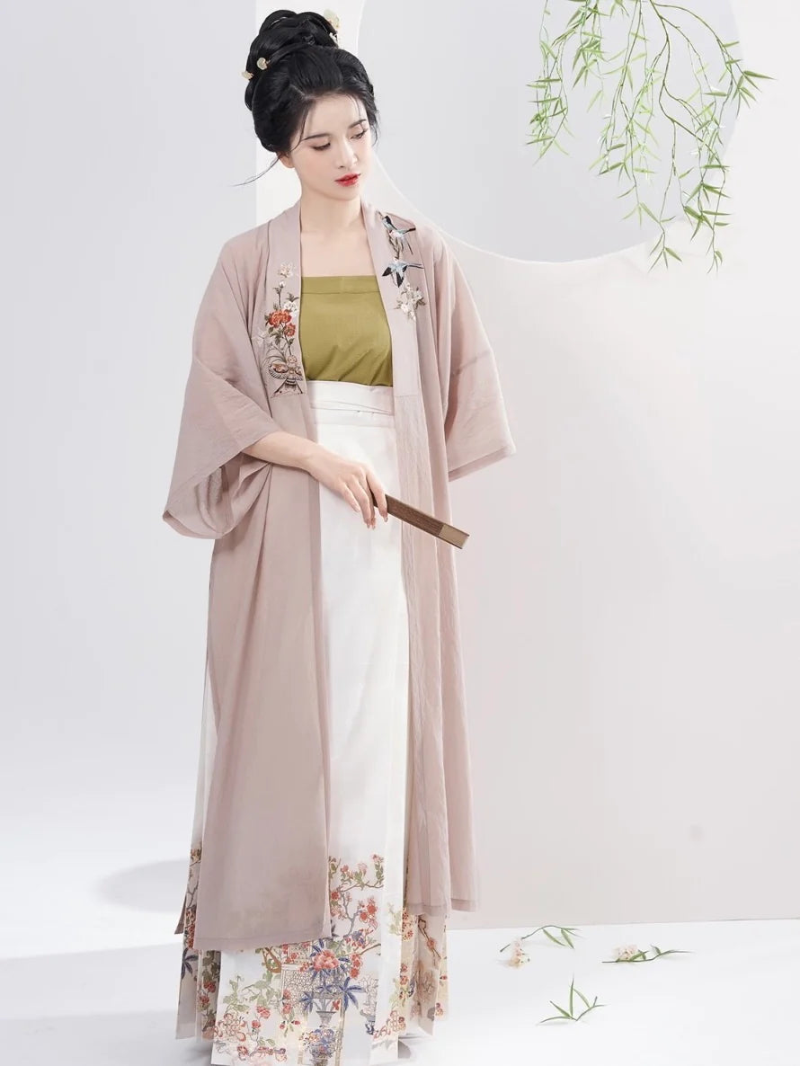 Experience the epitome of style with Classic Elegance Modern Hanfu—a seamless blend of tradition and contemporary allure. Elevate your wardrobe with this captivating ensemble, embodying the timeless beauty of ancient Chinese fashion. Classic Elegance invites you to rediscover grace and cultural richness, seamlessly blending tradition with modern sophistication.