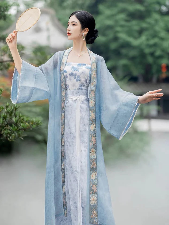 Elevate your style with the Parisian Chic Modern Hanfu Ensemble, a harmonious blend of modern sophistication and timeless beauty. Immerse yourself in the allure of our Modern Hanfu collection, seamlessly capturing the essence of tradition with a contemporary touch. Discover the sophistication and grace of traditional Chinese fashion with the Parisian Chic