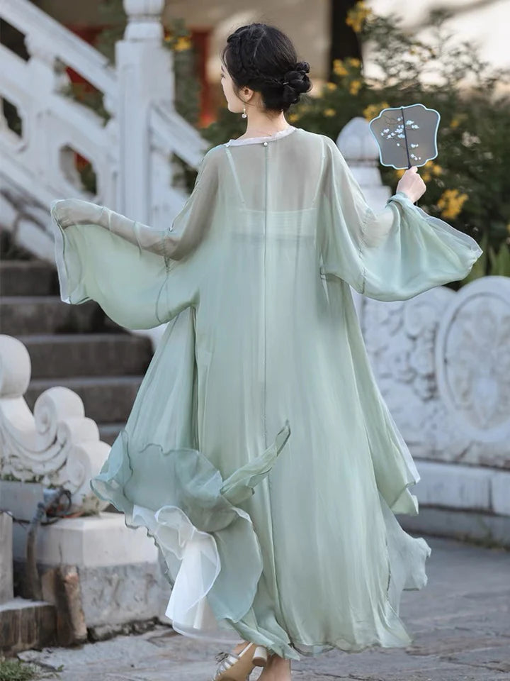 Elevate your style with the Paisley Dreams Modern Hanfu Ensemble, a harmonious blend of modern sophistication and timeless beauty. Immerse yourself in the allure of our Modern Hanfu collection, seamlessly capturing the essence of tradition with a contemporary touch. Discover the sophistication and grace of traditional Chinese fashion with the Paisley Dreams.