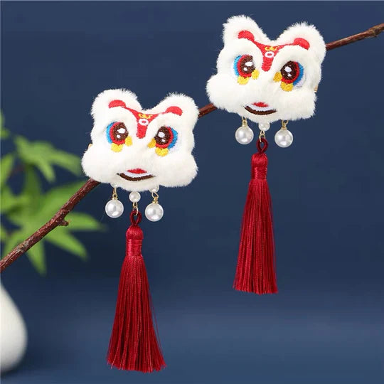 Lion Dance-Inspired Hair Clip - Channel the vibrant energy of the lion dance with this captivating hair clip, featuring intricate designs inspired by the traditional Chinese performance.