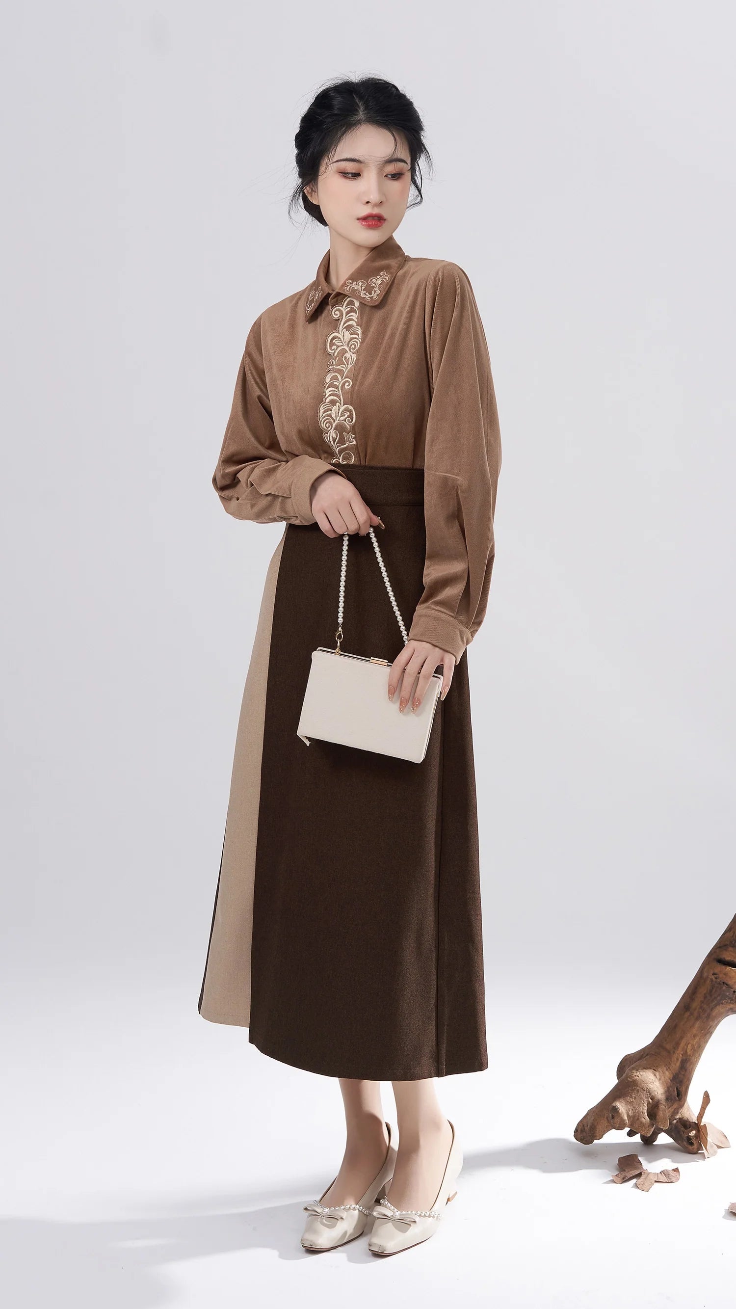 Embrace modern grace with our Modern Hanfu, Eliza—an enchanting blend of tradition and contemporary allure. This captivating ensemble pays homage to cultural heritage while embodying the chic sophistication of the modern era. Elevate your style with the Eliza Modern Hanfu, making a statement that seamlessly blends the richness of the past with the elegance of today for a uniquely refined look.