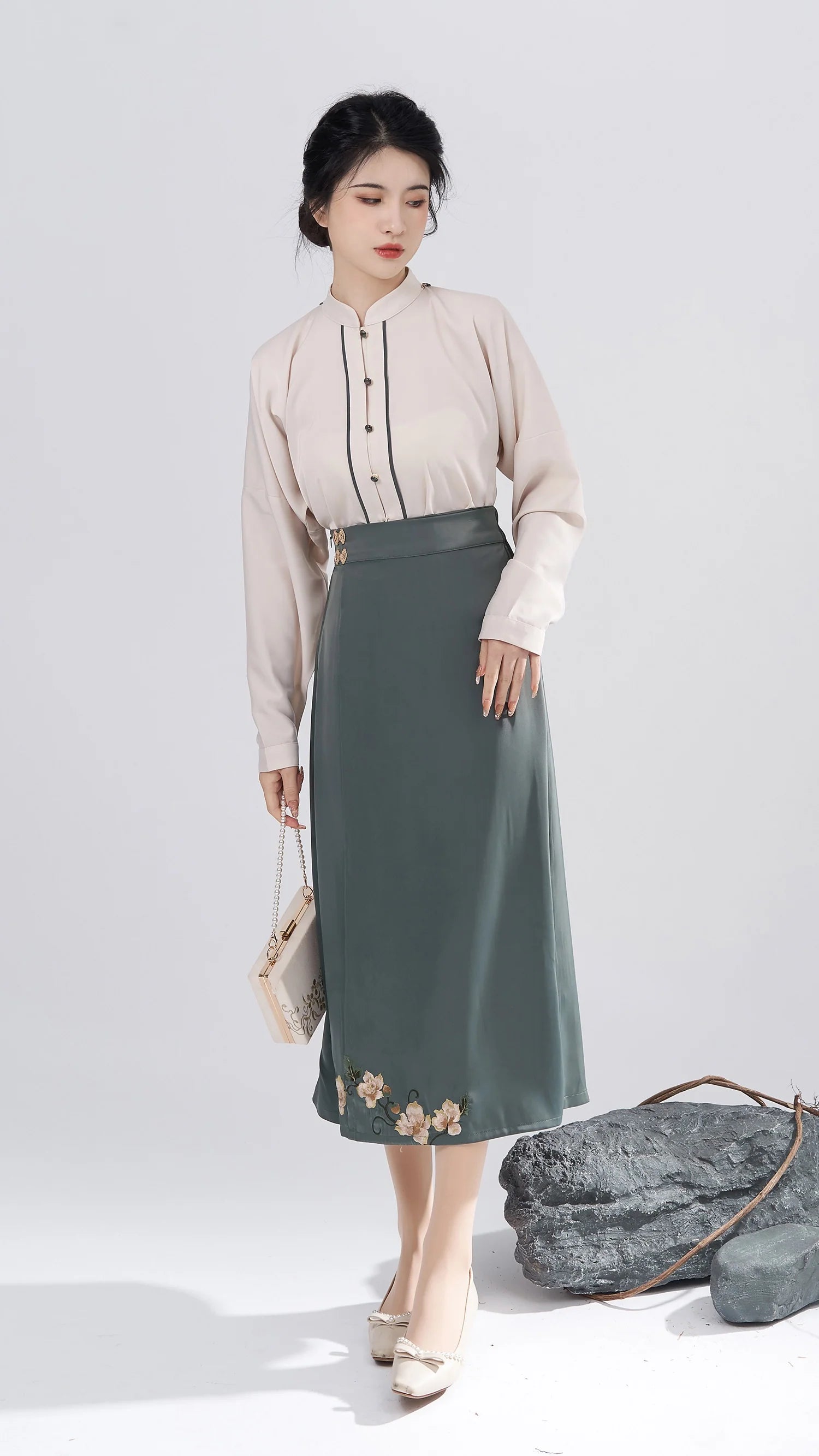 Immerse yourself in chic elegance with our Modern Hanfu, Hesther—a perfect fusion of tradition and contemporary allure. This captivating ensemble pays tribute to cultural heritage while embracing modern sophistication. Elevate your style with the Hesther Modern Hanfu, making a statement that seamlessly blends the past and present for a uniquely refined and timeless look.