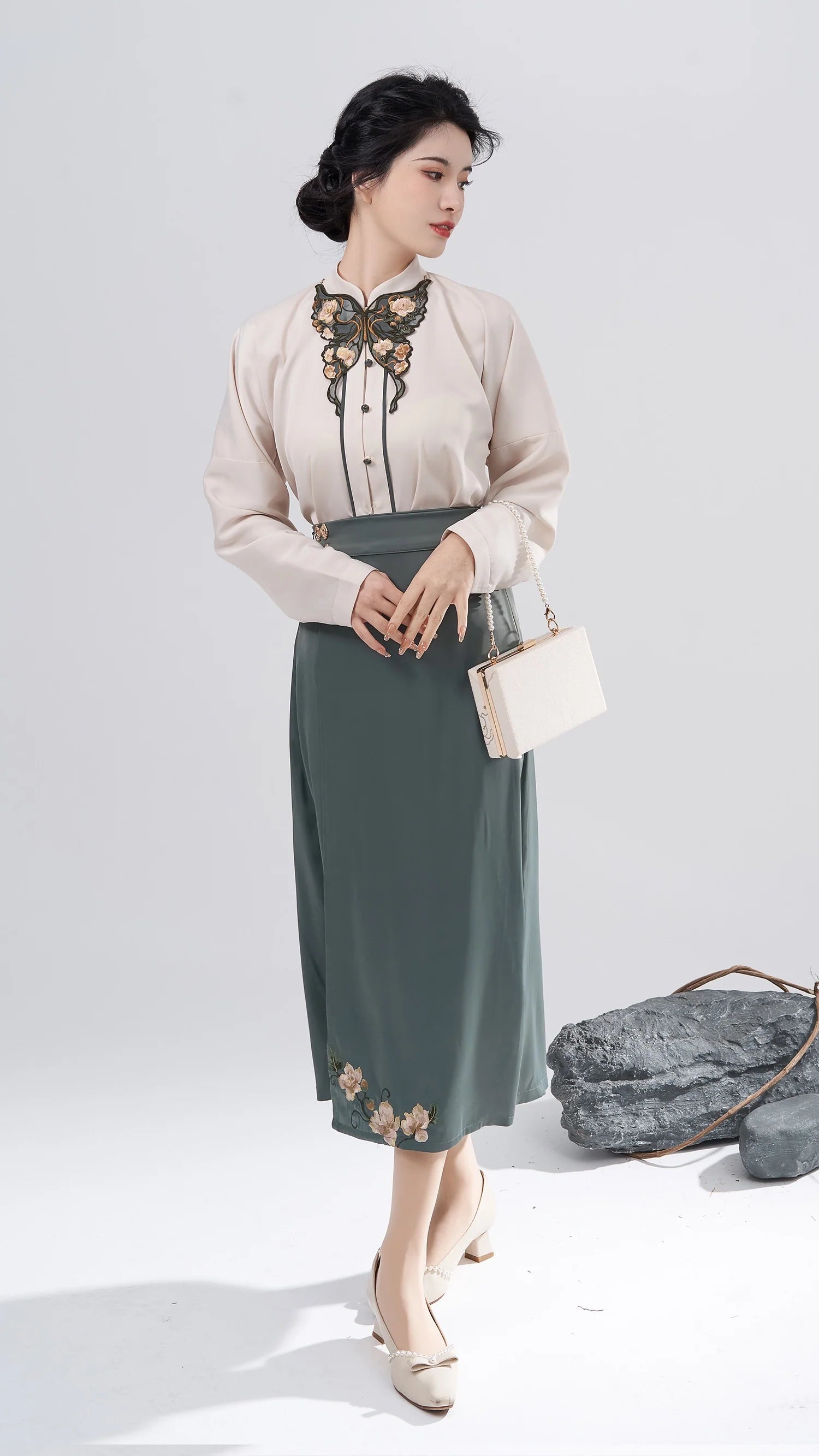 Immerse yourself in chic elegance with our Modern Hanfu, Hesther—a perfect fusion of tradition and contemporary allure. This captivating ensemble pays tribute to cultural heritage while embracing modern sophistication. Elevate your style with the Hesther Modern Hanfu, making a statement that seamlessly blends the past and present for a uniquely refined and timeless look.