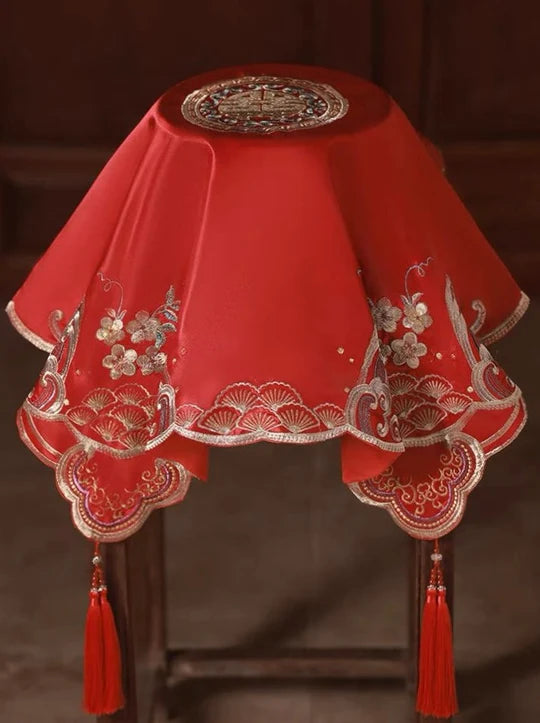 Discover the cultural significance of red veils in Chinese weddings—vibrant and auspicious, symbolizing happiness, love, and good luck. Available at Moon Hanfu.