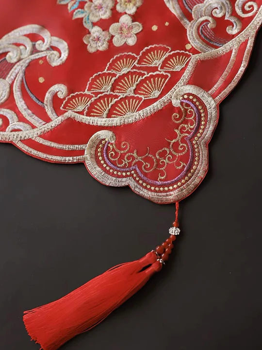 Discover the cultural significance of red veils in Chinese weddings—vibrant and auspicious, symbolizing happiness, love, and good luck. Available at Moon Hanfu.