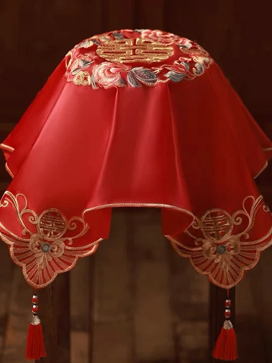 Discover the cultural significance of red veils in Chinese weddings—vibrant and auspicious, symbolizing happiness, love, and good luck. Available at Moon Hanfu.