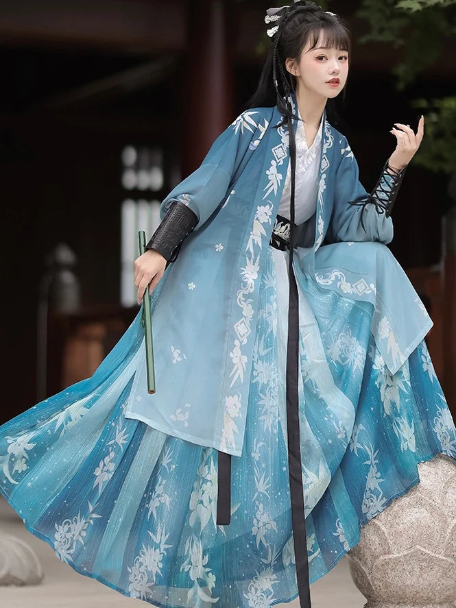 Step into timeless elegance with Stella Jiaoling Ruqun, a captivating blend of tradition and contemporary allure inspired by the Wei Jin Dynasty. Immerse yourself in the distinctive style of cross-collared and wide-sleeved garments, echoing the iconic Jin Ru 晋襦 and Za Ju 杂裾 fashion trends. Elevate your connection to Chinese tradition through Moon Hanfu&