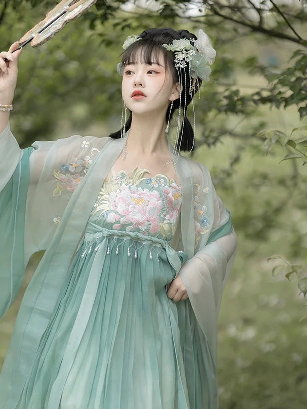 Explore the timeless elegance of Enchanting Lina silk cardigan set, inspired by the Southern Song dynasty gem Hezi Qun. Intricate embroidery and motifs elevate this garment, offering a glimpse into ancient sophistication.