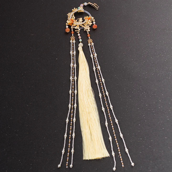 Lina Hanfu Hairpin - Enhance your Hanfu ensemble with the timeless elegance of the Lina Hanfu Hairpin. Its delicate design and intricate detailing add a touch of grace and sophistication to your hairstyle, reflecting the rich cultural heritage of traditional Chinese fashion.