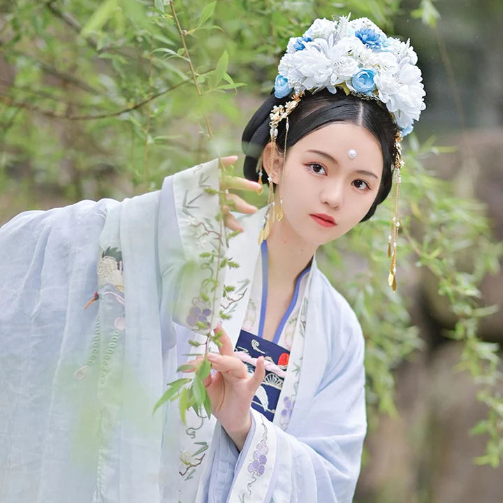 Blossom Hanfu Crown - Experience the enchantment of blooming flowers with the Blossom Hanfu Crown. Its graceful design and intricate floral patterns add a touch of natural beauty, perfect for spring festivals, garden-themed events, or adding a botanical charm to your Hanfu ensemble. Embrace the blossoming aura with this exquisite crown.