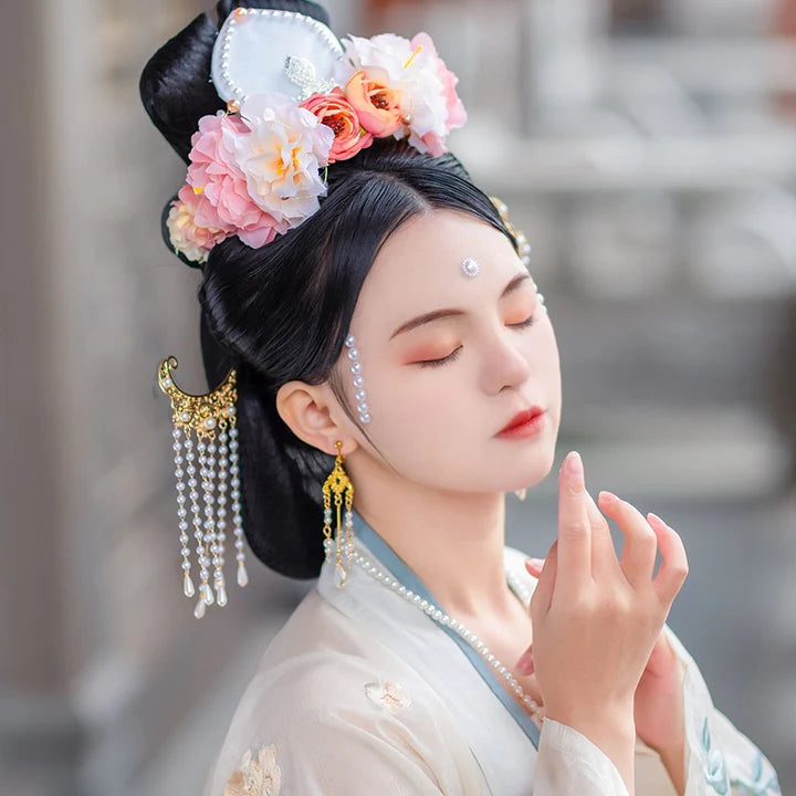 Floura Hanfu Crown - Unleash your inner floral beauty with the Floura Hanfu Crown. Its captivating design and delicate floral motifs add a touch of natural elegance, perfect for weddings, garden parties, or any special occasion. Embrace your inner flower princess with this enchanting crown.