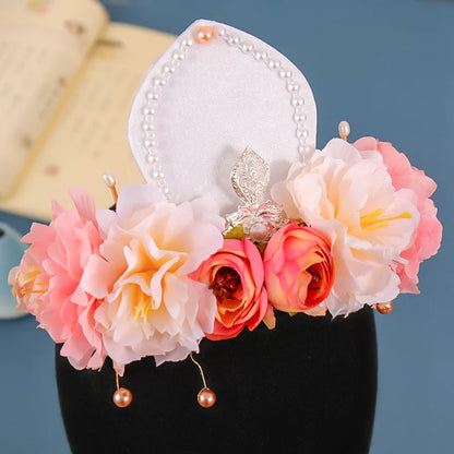 Floura Hanfu Crown - Unleash your inner floral beauty with the Floura Hanfu Crown. Its captivating design and delicate floral motifs add a touch of natural elegance, perfect for weddings, garden parties, or any special occasion. Embrace your inner flower princess with this enchanting crown.