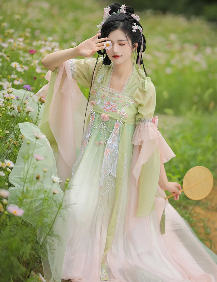 Step into enchantment with the Qixiong Ruqun, beautifully embodied in the Enchanted Fairy ensemble. Immerse yourself in the captivating blend of tradition and contemporary charm, embracing a fairy-like allure that adds a touch of magic and elegance to your wardrobe.