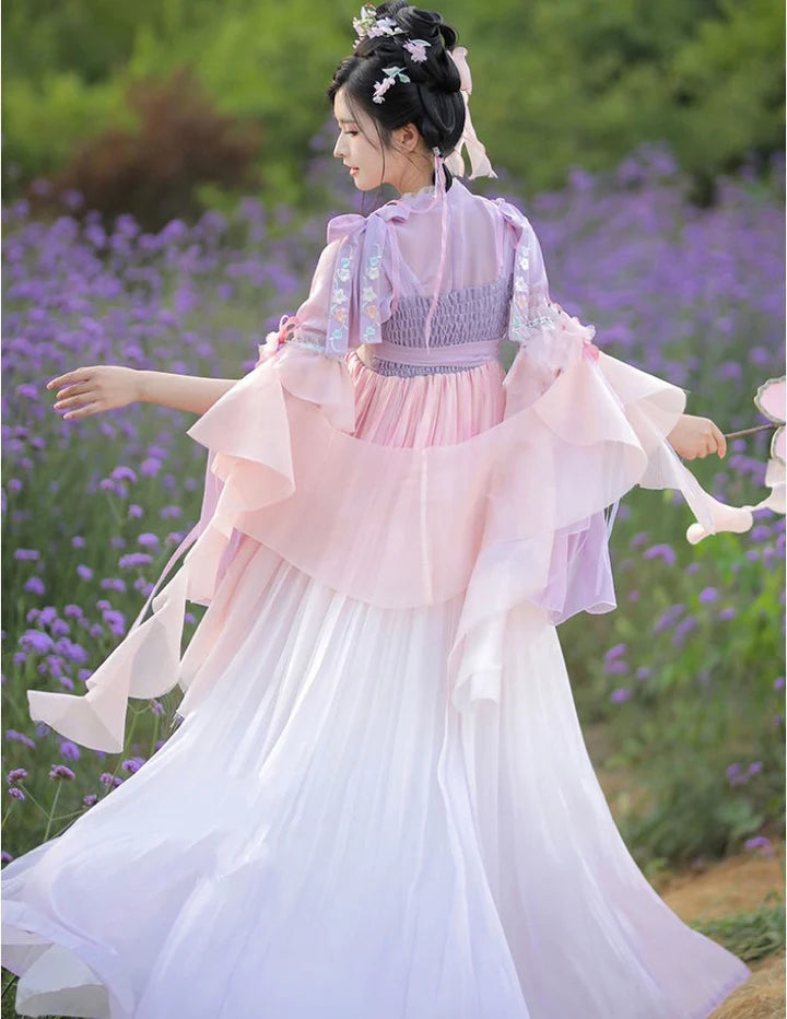 Step into enchantment with the Qixiong Ruqun, beautifully embodied in the Enchanted Fairy ensemble. Immerse yourself in the captivating blend of tradition and contemporary charm, embracing a fairy-like allure that adds a touch of magic and elegance to your wardrobe.