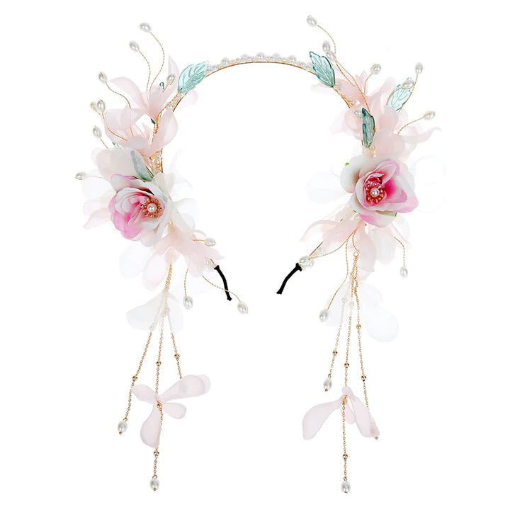 Melody Flowers Headband - Unleash your inner rhythm with the Melody Flowers Headband. Its whimsical design and delicate floral accents add a touch of musical elegance, perfect for music festivals, garden parties, or adding a harmonious charm to your look. Embrace the melodic aura with this enchanting headband.