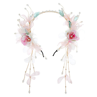 Melody Flowers Headband - Unleash your inner rhythm with the Melody Flowers Headband. Its whimsical design and delicate floral accents add a touch of musical elegance, perfect for music festivals, garden parties, or adding a harmonious charm to your look. Embrace the melodic aura with this enchanting headband.