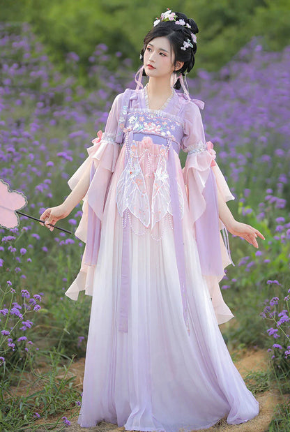 Step into enchantment with the Qixiong Ruqun, beautifully embodied in the Enchanted Fairy ensemble. Immerse yourself in the captivating blend of tradition and contemporary charm, embracing a fairy-like allure that adds a touch of magic and elegance to your wardrobe.