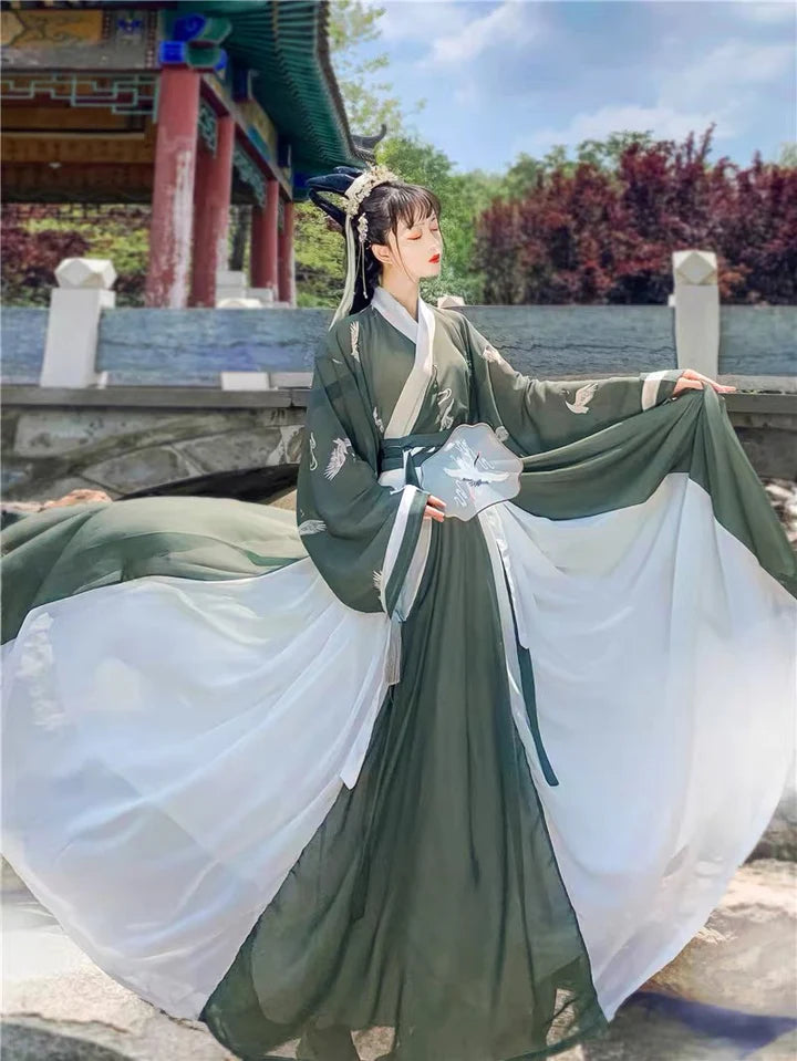 Step into timeless elegance with Joana Jiaoling Ruqun, a captivating blend of tradition and contemporary allure inspired by the Wei Jin Dynasty. Immerse yourself in the distinctive style of cross-collared and wide-sleeved garments, echoing the iconic Jin Ru 晋襦 and Za Ju 杂裾 fashion trends. Elevate your connection to Chinese tradition through Moon Hanfu&