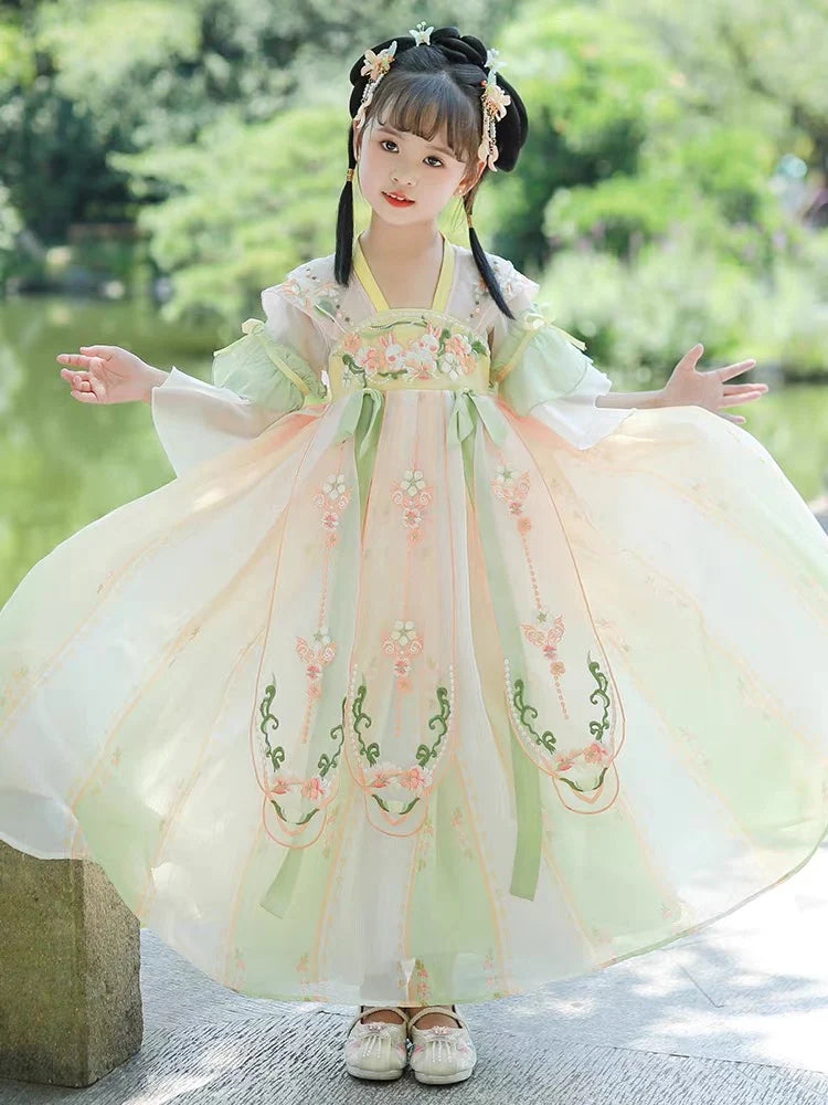 Step into blooming elegance with Blooming Tulips Kids Hanfu – a collection that transcends clothing to foster cultural connection, imaginative play, and creative expression for your little ones.