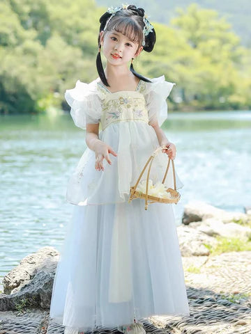 Step into radiant elegance with Radiant Saffron Kids Hanfu – a collection that transcends clothing to foster cultural connection, imaginative play, and creative expression for your little ones.