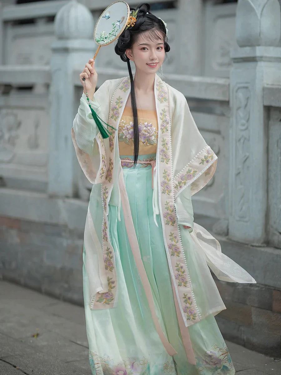 Immerse yourself in the tranquil elegance of our Qiyao Ruqun ensemble, Pure Serenity. Experience the harmonious blend of tradition and contemporary allure, stepping into a world of pure beauty and cultural refinement.