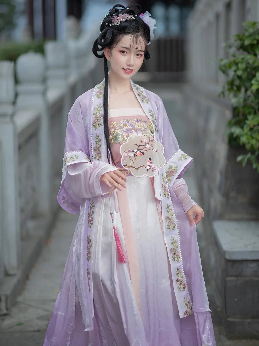 Immerse yourself in the tranquil elegance of our Qiyao Ruqun ensemble, Pure Serenity. Experience the harmonious blend of tradition and contemporary allure, stepping into a world of pure beauty and cultural refinement.