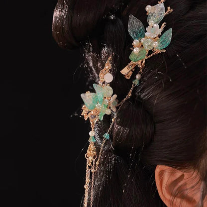 Solena Hanfu Hair Adornments - Elevate your style with the captivating Solena Hanfu Hair Accessories collection, designed to add a touch of allure and sophistication to your ensemble. From intricately designed hairpins (发簪, fāzān) to stylish hair combs (发篦, fābì), graceful tassels (流苏, liúsū), ornate hair ornaments (发髻, fājì), and versatile hairbands and headpieces (发饰, fāshì), each piece is meticulously crafted to enhance your appearance and express your unique style.