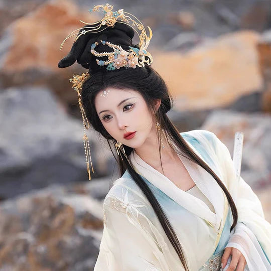 Elevate your style with the captivating Princess Hanfu Hair Accessories collection, designed to add a touch of elegance and regal beauty to your ensemble. From intricately designed hairpins (发簪, fāzān) to stylish hair combs (发篦, fābì), graceful tassels (流苏, liúsū), ornate hair ornaments (发髻, fājì), and versatile hairbands and headpieces (发饰, fāshì), each piece is meticulously crafted to enhance your appearance and express your unique style with the enchanting allure of a gorgeous princess.