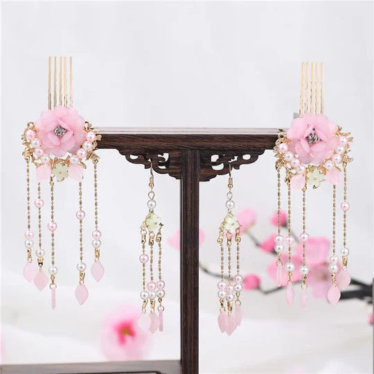 Luminous Lina Hanfu Hair Adornments - Elevate your style with the radiant beauty of Lina Hanfu Hair Accessories, designed to add a touch of elegance and luminosity to your ensemble. From intricately designed hairpins (发簪, fāzān) to stylish hair combs (发篦, fābì), graceful tassels (流苏, liúsū), ornate hair ornaments (发髻, fājì), and versatile hairbands and headpieces (发饰, fāshì), each piece is carefully crafted to enhance your appearance and express your unique style with a luminous charm.