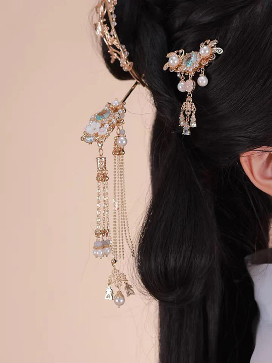 Elevate your style with the charming Delightful Hanfu Hair Accessories collection, designed to add a touch of joy and beauty to your ensemble. From intricately designed hairpins (发簪, fāzān) to stylish hair combs (发篦, fābì), graceful tassels (流苏, liúsū), ornate hair ornaments (发髻, fājì), and versatile hairbands and headpieces (发饰, fāshì), each piece is carefully crafted to enhance your appearance and express your unique style with a delightful flair.