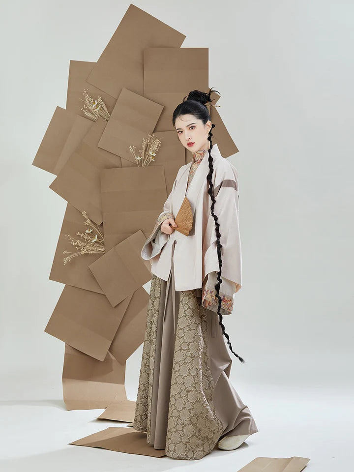 Immerse yourself in the epitome of style with our Modern Hanfu, Jasmin—a harmonious blend of tradition and contemporary flair. Jasmin captures the essence of modern elegance within the rich heritage of Hanfu, offering a captivating ensemble that transcends time. Elevate your fashion statement with this chic and culturally-inspired attire, celebrating the seamless fusion of past and present.