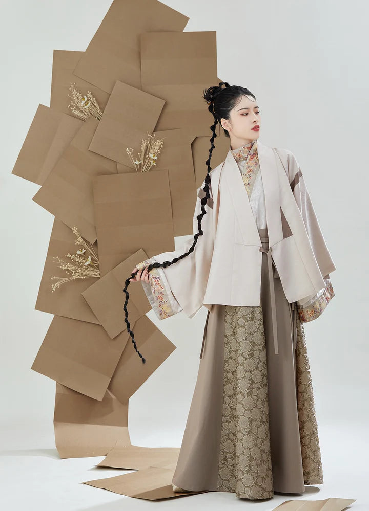 Immerse yourself in the epitome of style with our Modern Hanfu, Jasmin—a harmonious blend of tradition and contemporary flair. Jasmin captures the essence of modern elegance within the rich heritage of Hanfu, offering a captivating ensemble that transcends time. Elevate your fashion statement with this chic and culturally-inspired attire, celebrating the seamless fusion of past and present.