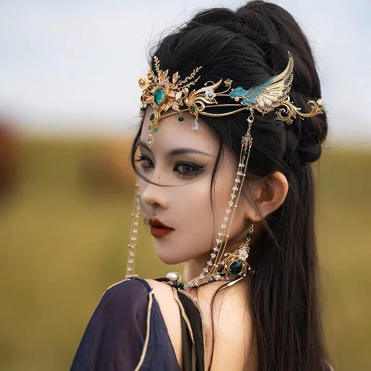 Dora Filigree Headdress - Adorn yourself with this exquisite headdress featuring intricate filigree work. Lightweight and adjustable, it adds elegance and sophistication to your hairstyle. Perfect for weddings, parties, or cultural events.