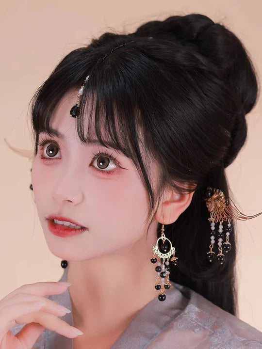 Elevate your style with the enchanting Midnight Hanfu Hair Accessories collection, designed to add a touch of mystery and allure to your ensemble. From intricately designed hairpins (发簪, fāzān) to stylish hair combs (发篦, fābì), graceful tassels (流苏, liúsū), ornate hair ornaments (发髻, fājì), and versatile hairbands and headpieces (发饰, fāshì), each piece is meticulously crafted to enhance your appearance and express your unique style with the captivating charm of a midnight sky.