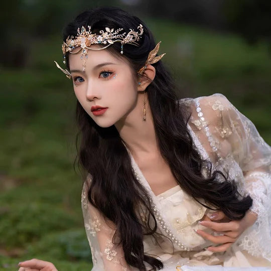 Elf Crown - Embrace the mystical allure with this enchanting crown. Intricate filigree patterns and sparkling gemstones capture the essence of elven royalty. Versatile and durable, perfect for costume parties or fantasy-themed events.