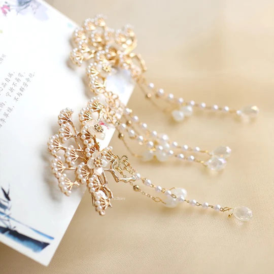 Fiona Chinese Hair Clips - Enhance your hairstyle with these elegant and sophisticated hair clips. Exquisite designs inspired by classic Chinese culture exude timeless beauty. Perfect for formal events, weddings, or adding refinement to everyday style.