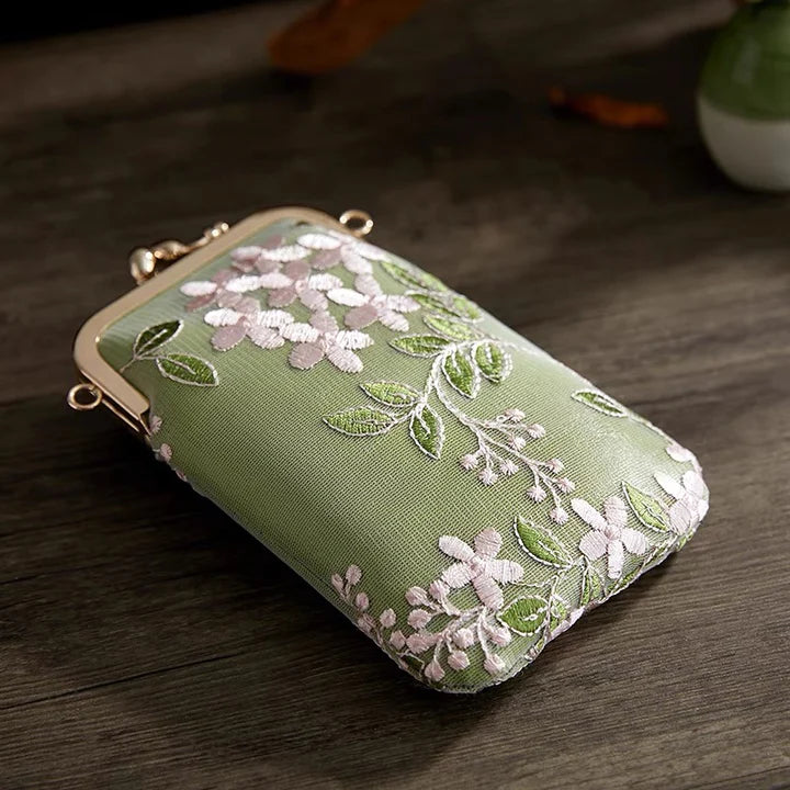 Elevate your mobile style with the Elegant Sage Phone Bag. Explore our curated collection at Moon Accessories for a sophisticated and functional accessory that seamlessly blends traditional charm with modern convenience.