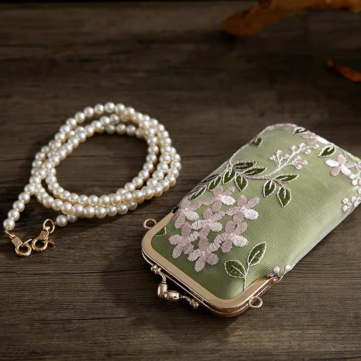 Elevate your mobile style with the Elegant Sage Phone Bag. Explore our curated collection at Moon Accessories for a sophisticated and functional accessory that seamlessly blends traditional charm with modern convenience.