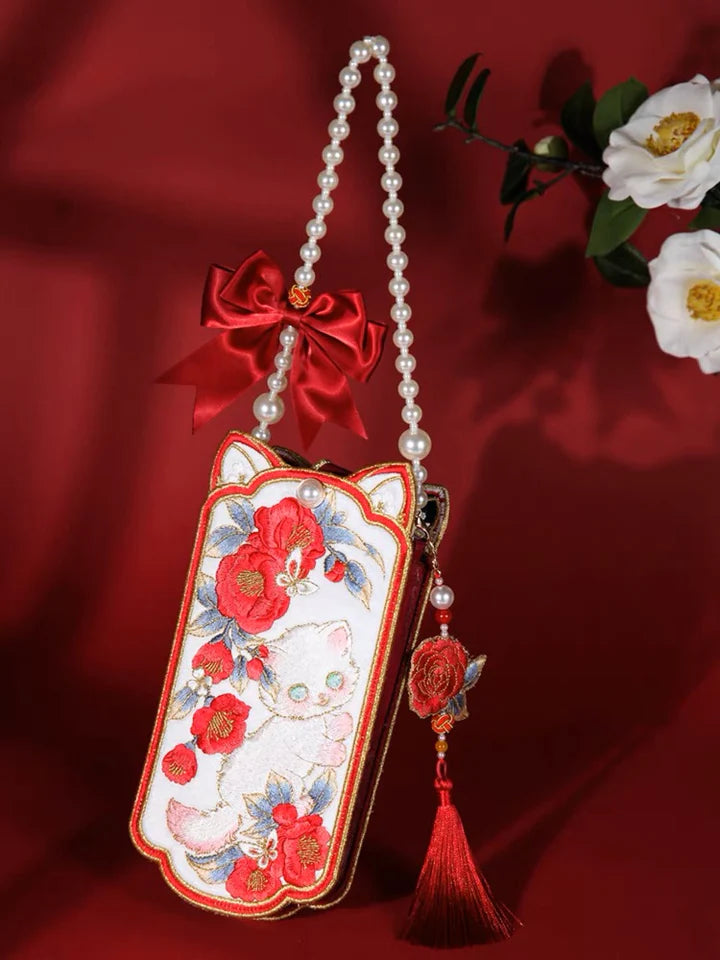 Carry your essentials in style with the Chic Feline Embroidered Phone Bag. Explore our curated collection at Moon Accessories for a fashionable and functional accessory that showcases the charm of embroidered feline details.