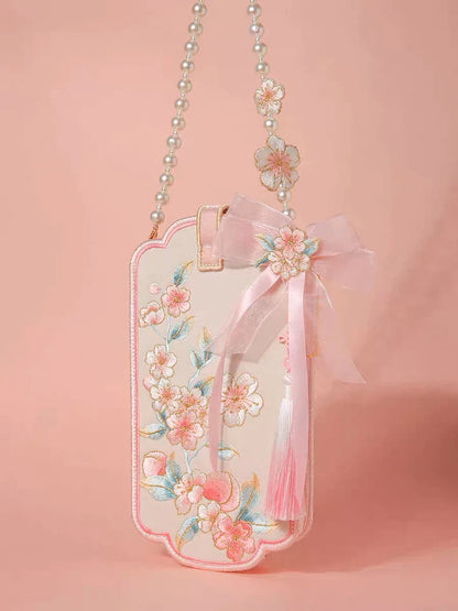 Elevate your style with the Blossom Bloom Embroidered Phone Bag. Explore our curated collection at Moon Accessories for a fashionable and functional accessory adorned with intricate cherry blossom embroidery, adding a touch of natural beauty to your ensemble.