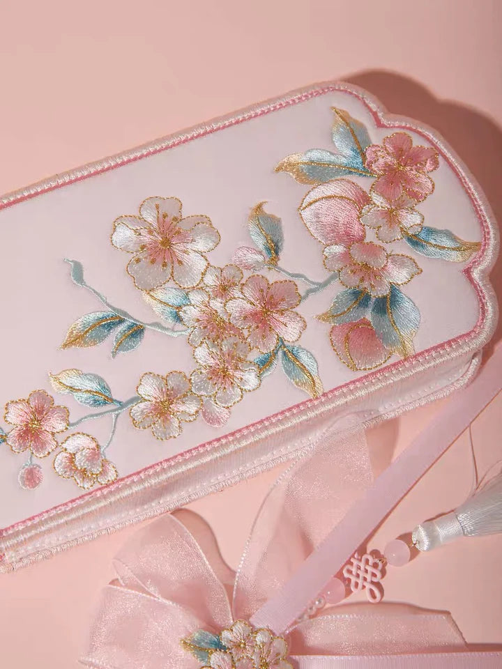 Elevate your style with the Blossom Bloom Embroidered Phone Bag. Explore our curated collection at Moon Accessories for a fashionable and functional accessory adorned with intricate cherry blossom embroidery, adding a touch of natural beauty to your ensemble.